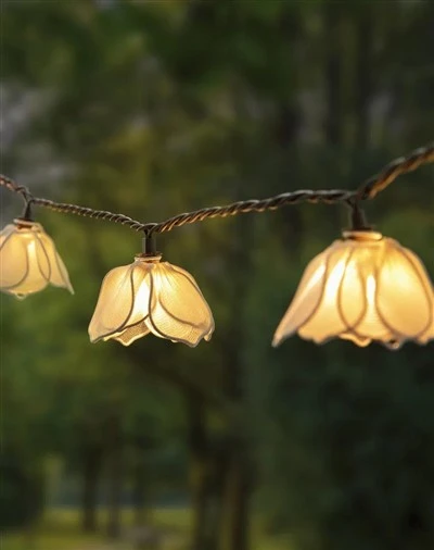 Niz LED luči s sončno belo rožo